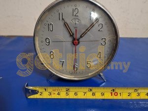 Old vintage mechanical metal alarm clock